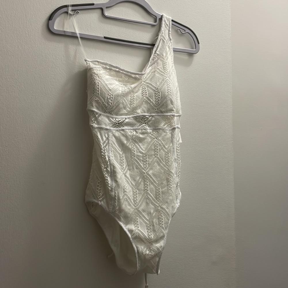 Becca color play asymmetrical one-piece swimsuit in white
